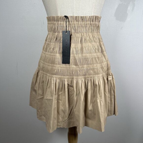 Dolce Cabo Dresses & Skirts - NWT DOLCE Cabo Faux Leather Pleated Skirt Ruching Detail Beige Women's Size XS